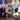 "Donald Trump and Narendra Modi shaking hands during a diplomatic meeting with U.S. and Indian flags in the background."